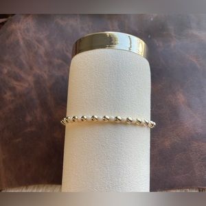 Beige and 14kt gold plated bracelet